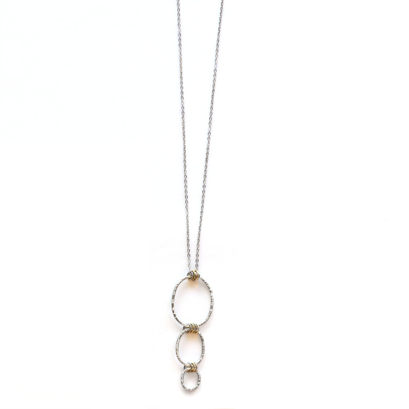 Pendentif long étain ciselé et acier