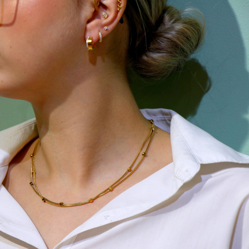 Collier double rangs cubes acier doré