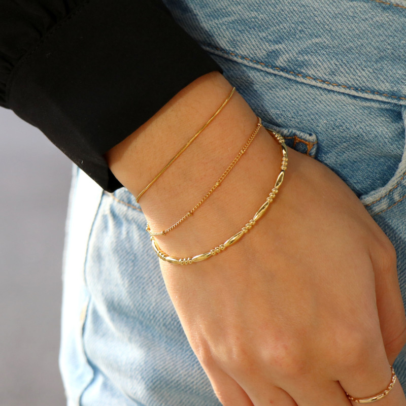 Bracelet demi jonc ethnique acier doré