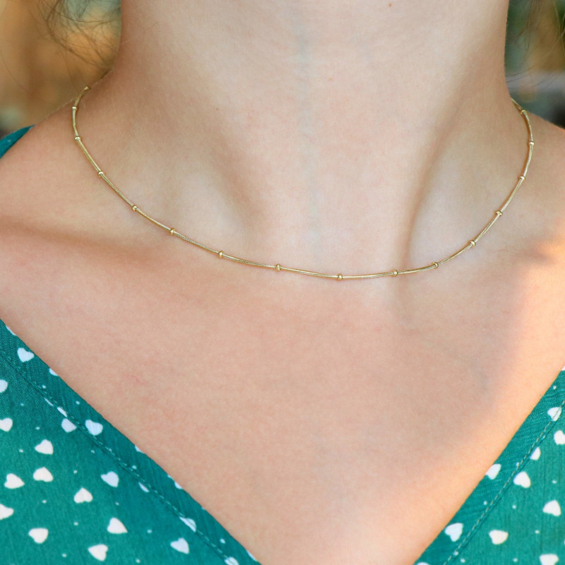 Collier fin chaîne boule acier doré