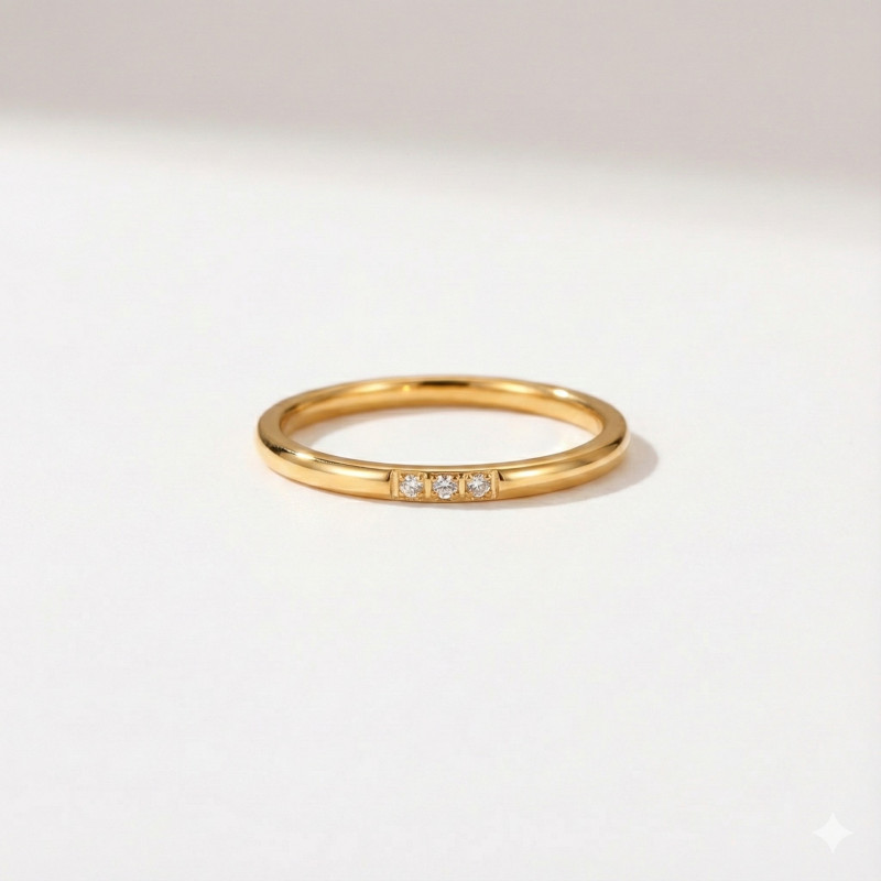 Bague fine 3 oxydes acier doré
