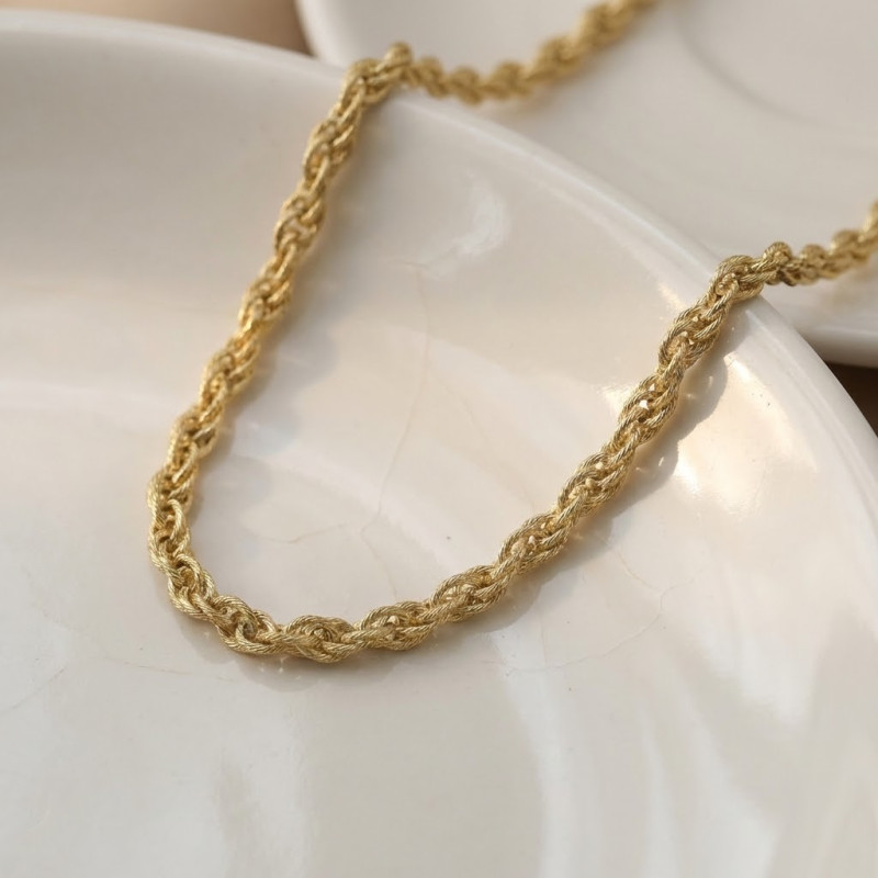 Collier maille torsadée acier doré