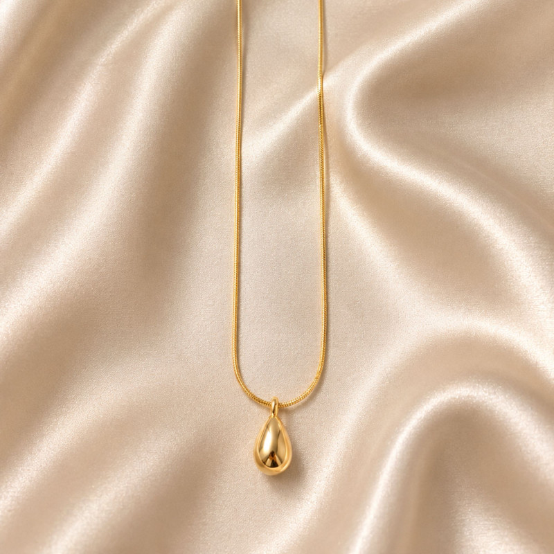Collier maille ronde goutte - acier doré