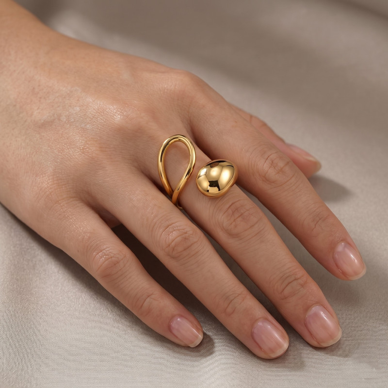 Bague croisée design acier doré
