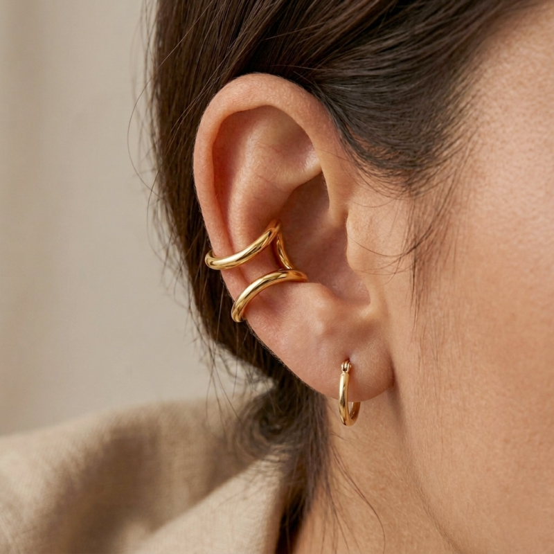 Bague d'oreille design - acier doré